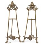 Pair of large Rococo style brass easel stands, 58cm high