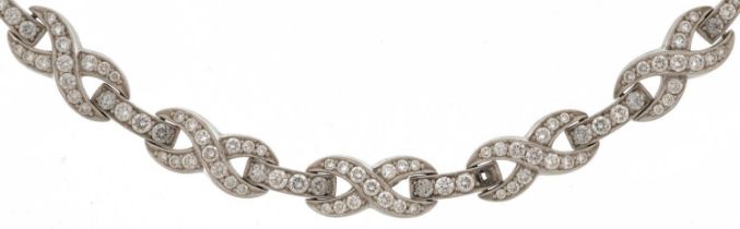 Good platinum diamond infinity link necklace, the largest diamonds approximately 2.10mm in diameter,