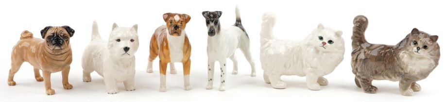 Six Beswick collectable cats and dogs including West Highland Terrier, Boxer dog and Persian Grey