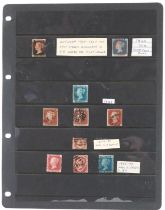 Victorian British stamps arranged on a sheet including Penny Black, Two Penny Blues and Penny Reds