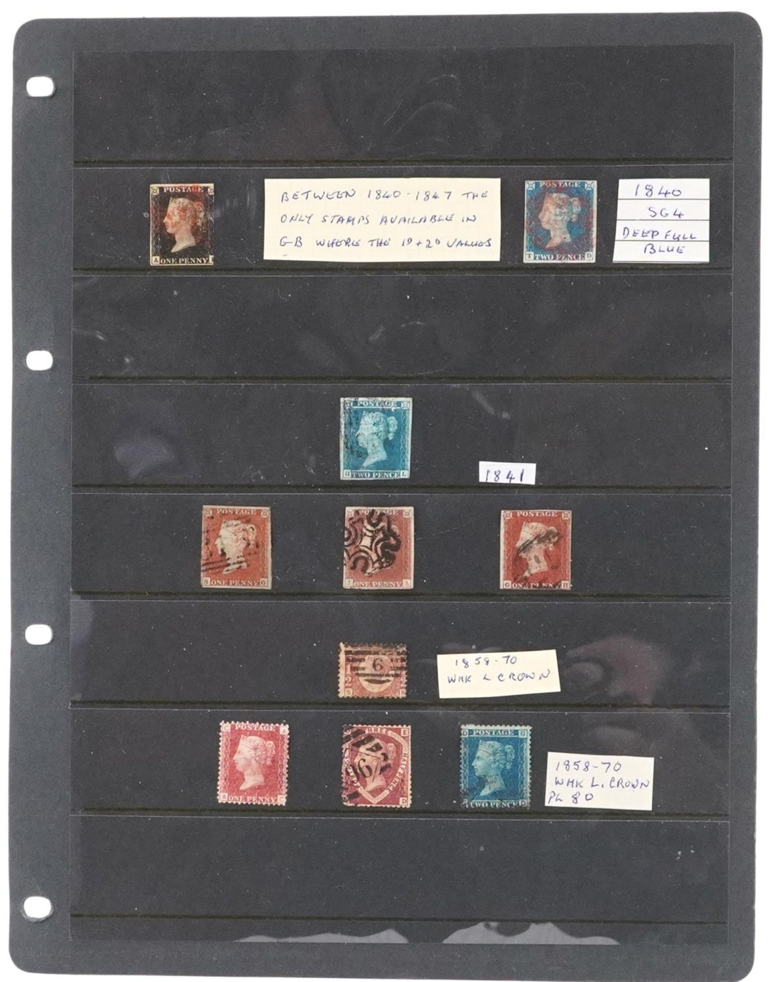 Victorian British stamps arranged on a sheet including Penny Black, Two Penny Blues and Penny Reds