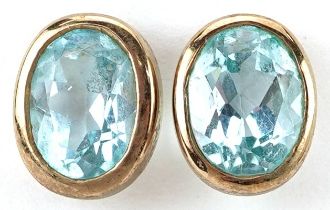 Pair of 9ct gold blue topaz stud earrings, each topaz approximately 8.0mm x 6.20mm x 4.40mm deep,