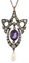 Art Nouveau style silver purple and clear paste openwork pendant with cultured pearl drop on a
