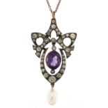 Art Nouveau style silver purple and clear paste openwork pendant with cultured pearl drop on a