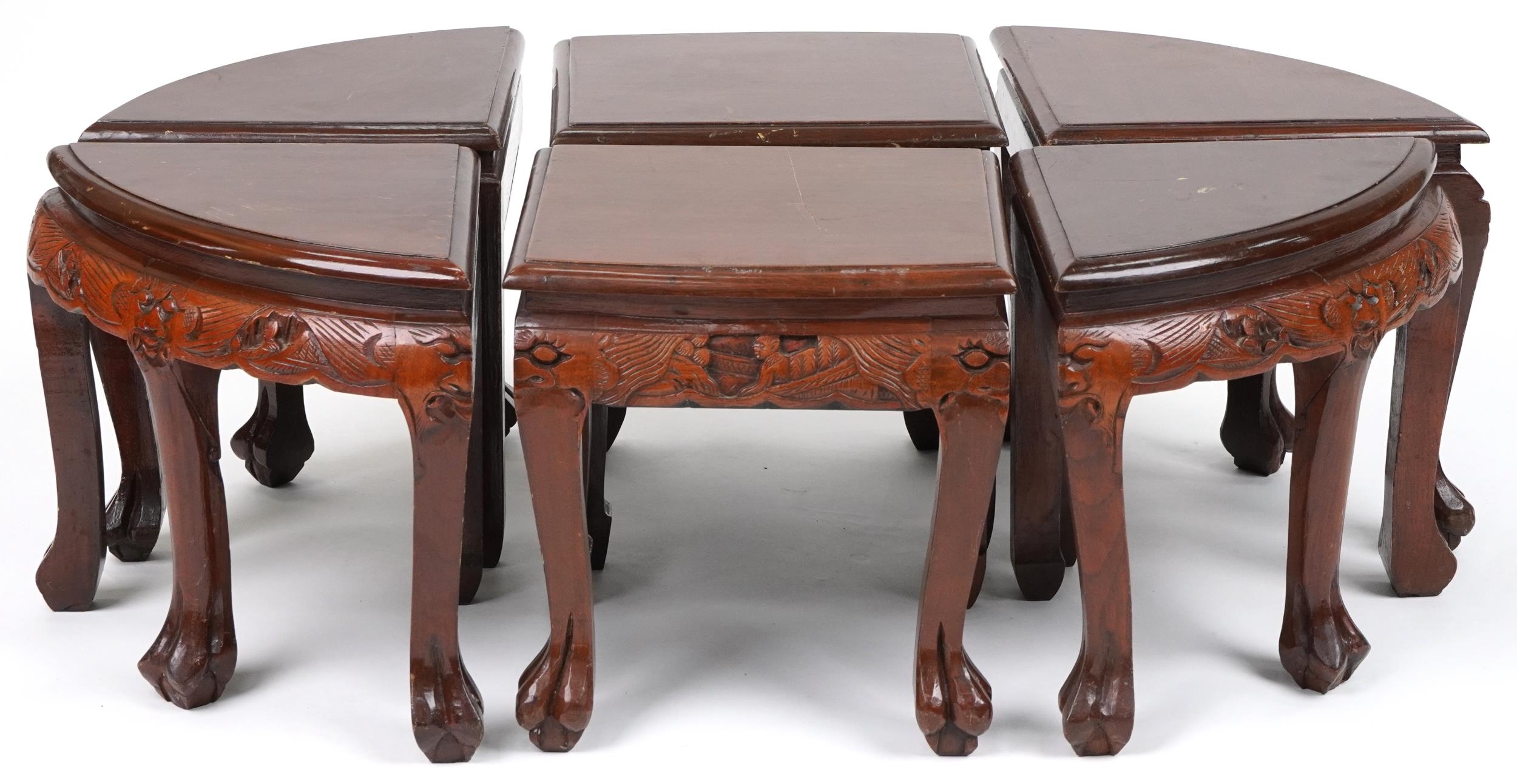 Nest of seven Chinese camphor wood occasional tables comprising an oval coffee table housing six - Image 9 of 9