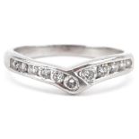 Platinum diamond wishbone ring, the largest diamond approximately 1.80mm in diameter, size K/L, 3.4g