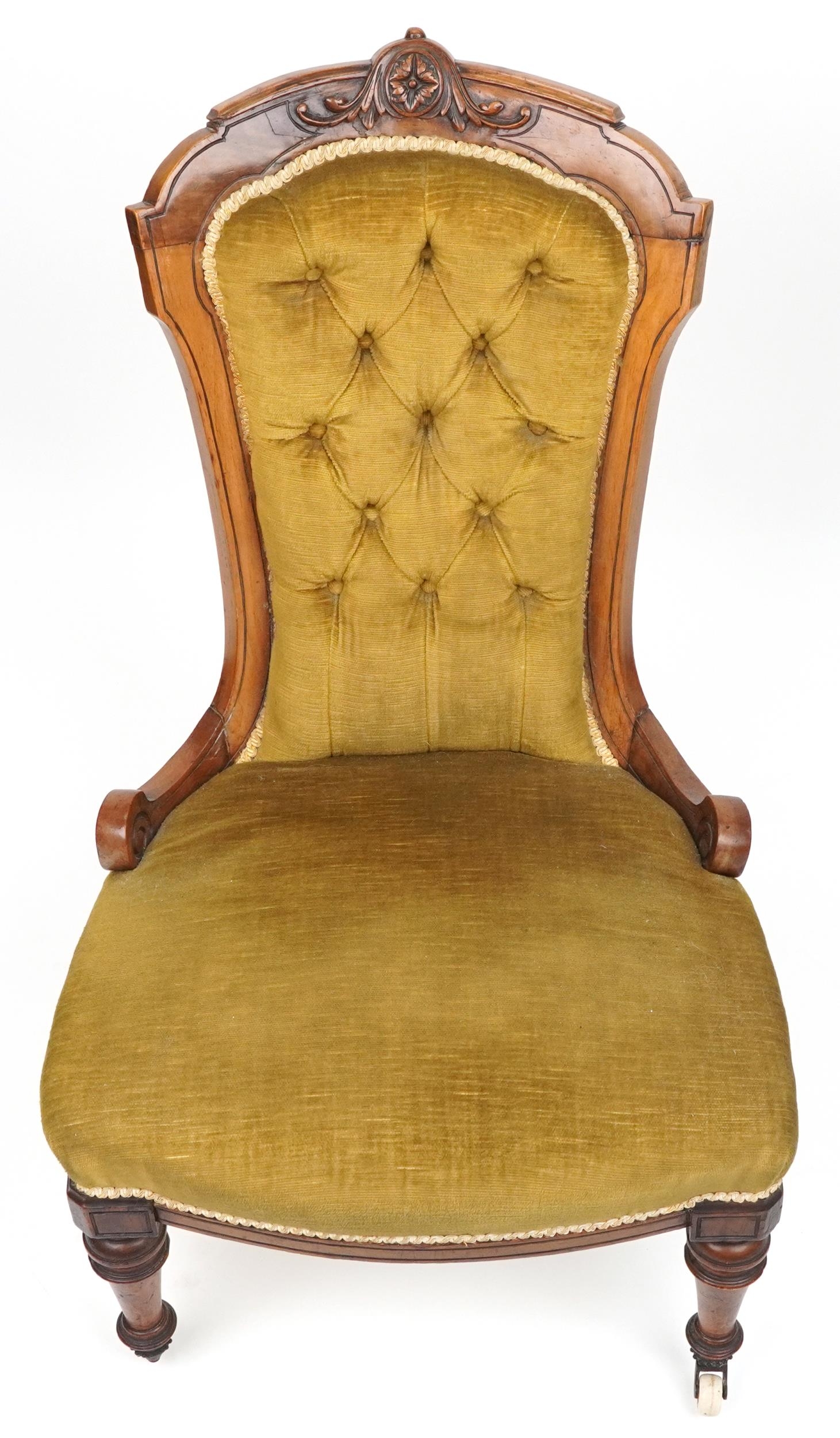 Victorian walnut side chair carved with a flower head and foliage having olive green button back - Image 3 of 4