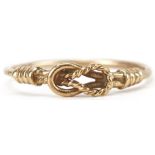 9ct gold love knot ring, size K/L, 0.8g