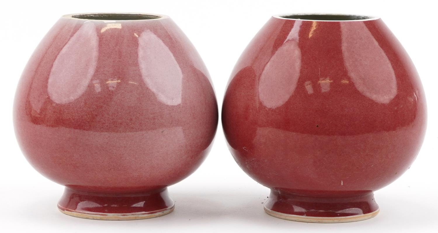 Pair of Chinese porcelain vases having sang de boeuf glazes, six figure character marks to the - Image 4 of 7