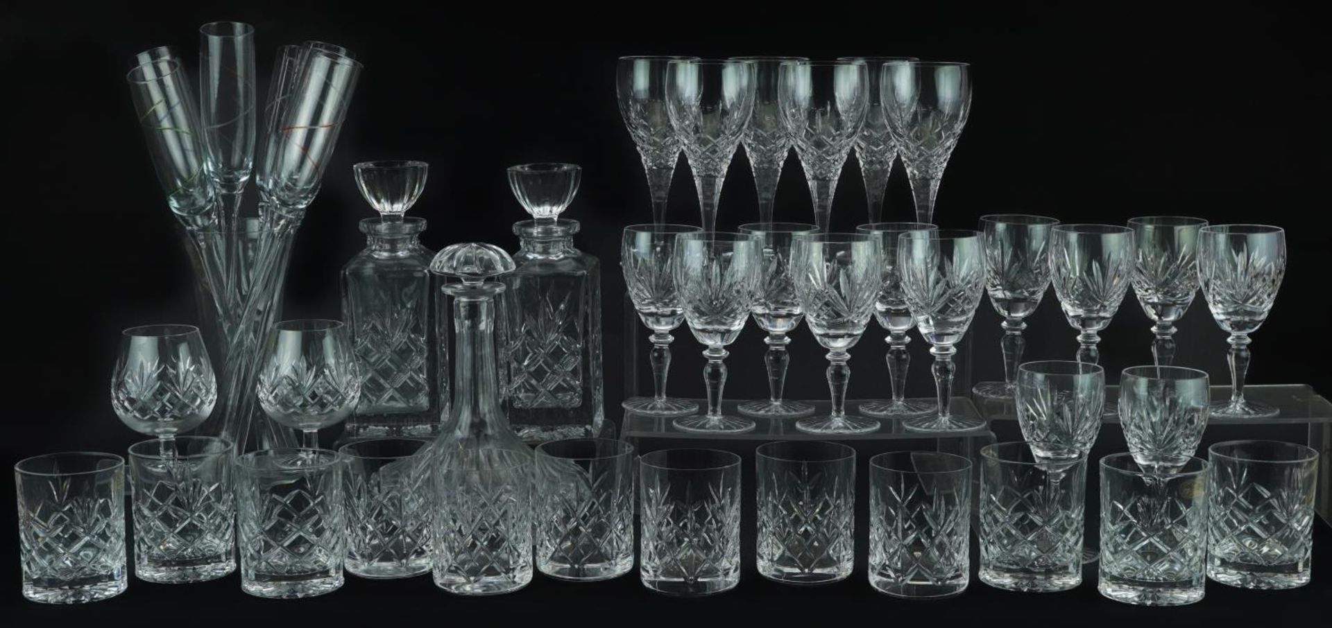 Glassware including Boyne Valley tumblers, three decanters and set of six Champagne flutes, the