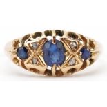 Antique 18ct gold sapphire and diamond seven stone ring with pierced ornate setting, the largest