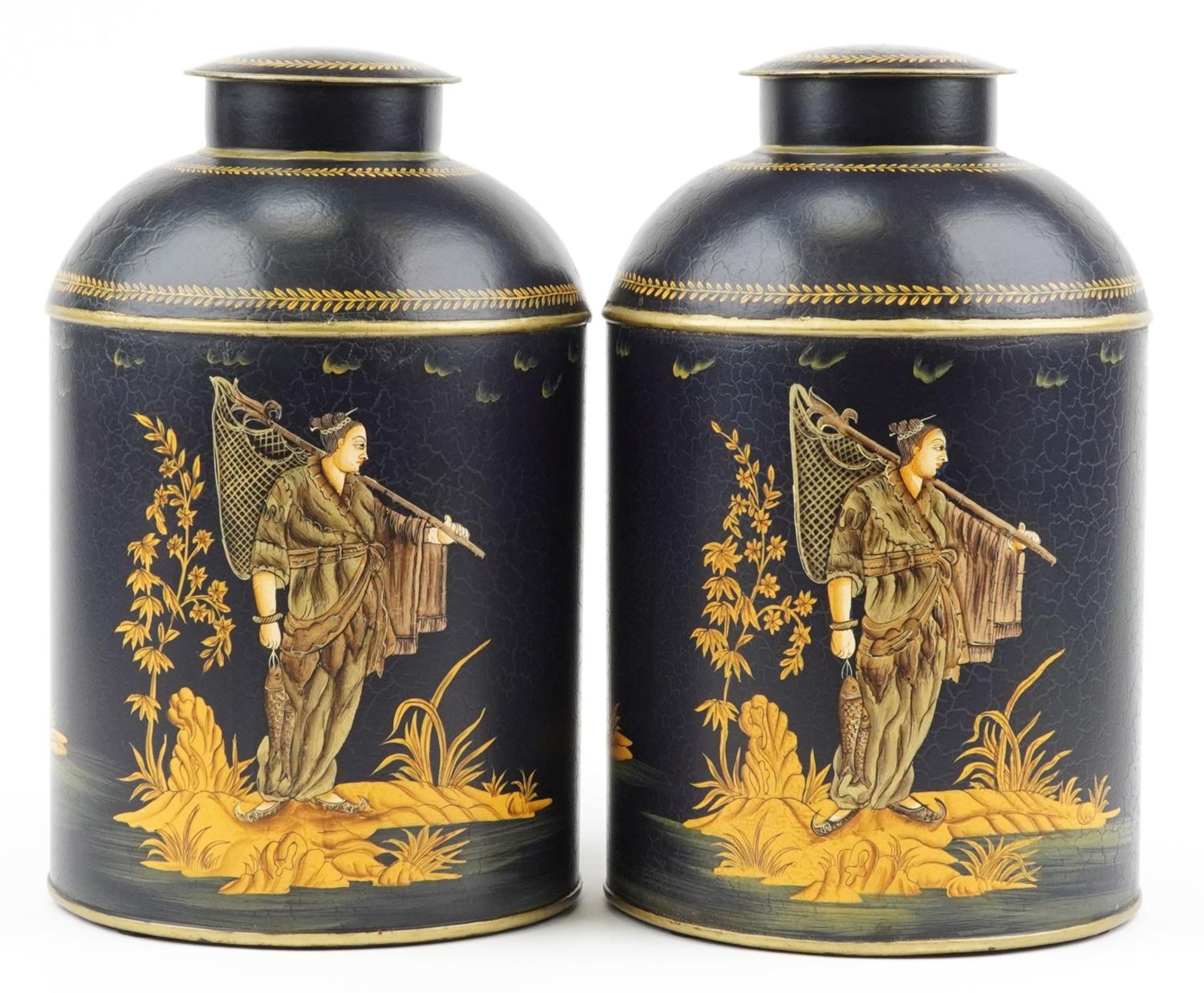 Pair of Toleware cannisters decorated in the chinoiserie manner with fishermen, 36cm high