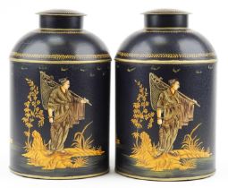 Pair of Toleware cannisters decorated in the chinoiserie manner with fishermen, 36cm high