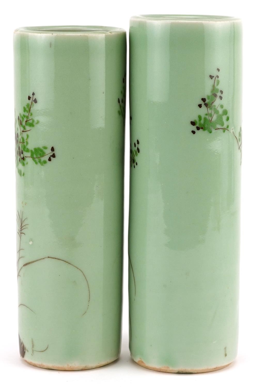 Matched pair of Japanese celadon glazed porcelain cylindrical vases hand painted with flowers, - Image 3 of 6