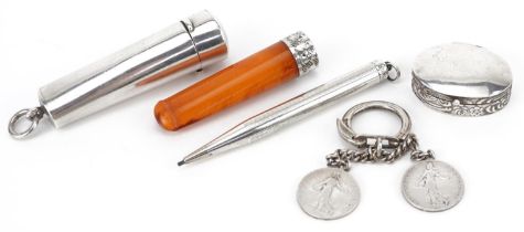 Edwardian and later silver objects including a butterscotch amber coloured cheroot holder with