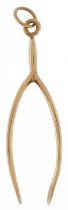Large 9ct gold pendant in the form of wishbone, 5.2cm high, 5.0g