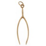 Large 9ct gold pendant in the form of wishbone, 5.2cm high, 5.0g