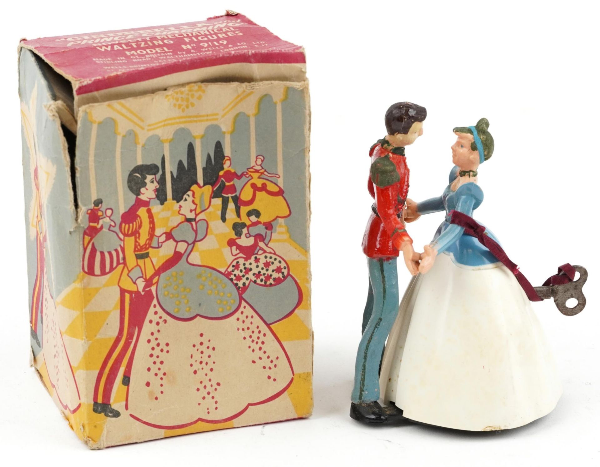 Vintage clockwork Cinderella and Prince Charming novelty mechanical waltzing figures with box