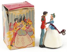 Vintage clockwork Cinderella and Prince Charming novelty mechanical waltzing figures with box