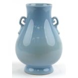 Large Chinese porcelain vase having a clair de lune type glaze with twin handles, six figure