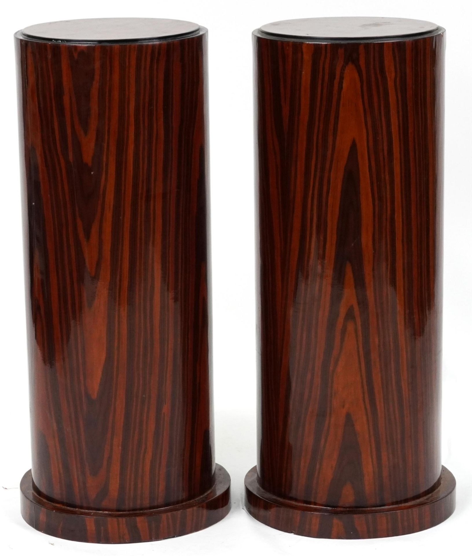 Pair of Art Deco style rosewood effect cylindrical columns, each 80cm high