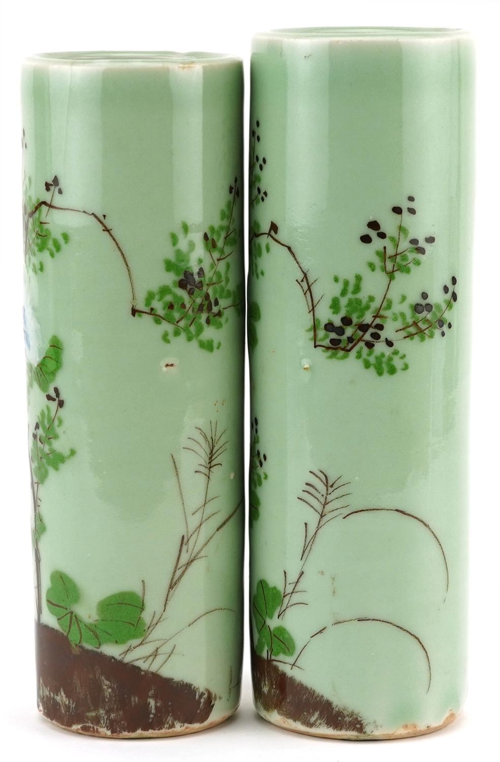 Matched pair of Japanese celadon glazed porcelain cylindrical vases hand painted with flowers, - Image 2 of 6