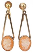 Pair of cameo shell drop earrings carved with maiden heads having screw backs, each 3.4cm high,