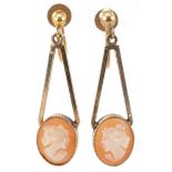 Pair of cameo shell drop earrings carved with maiden heads having screw backs, each 3.4cm high,