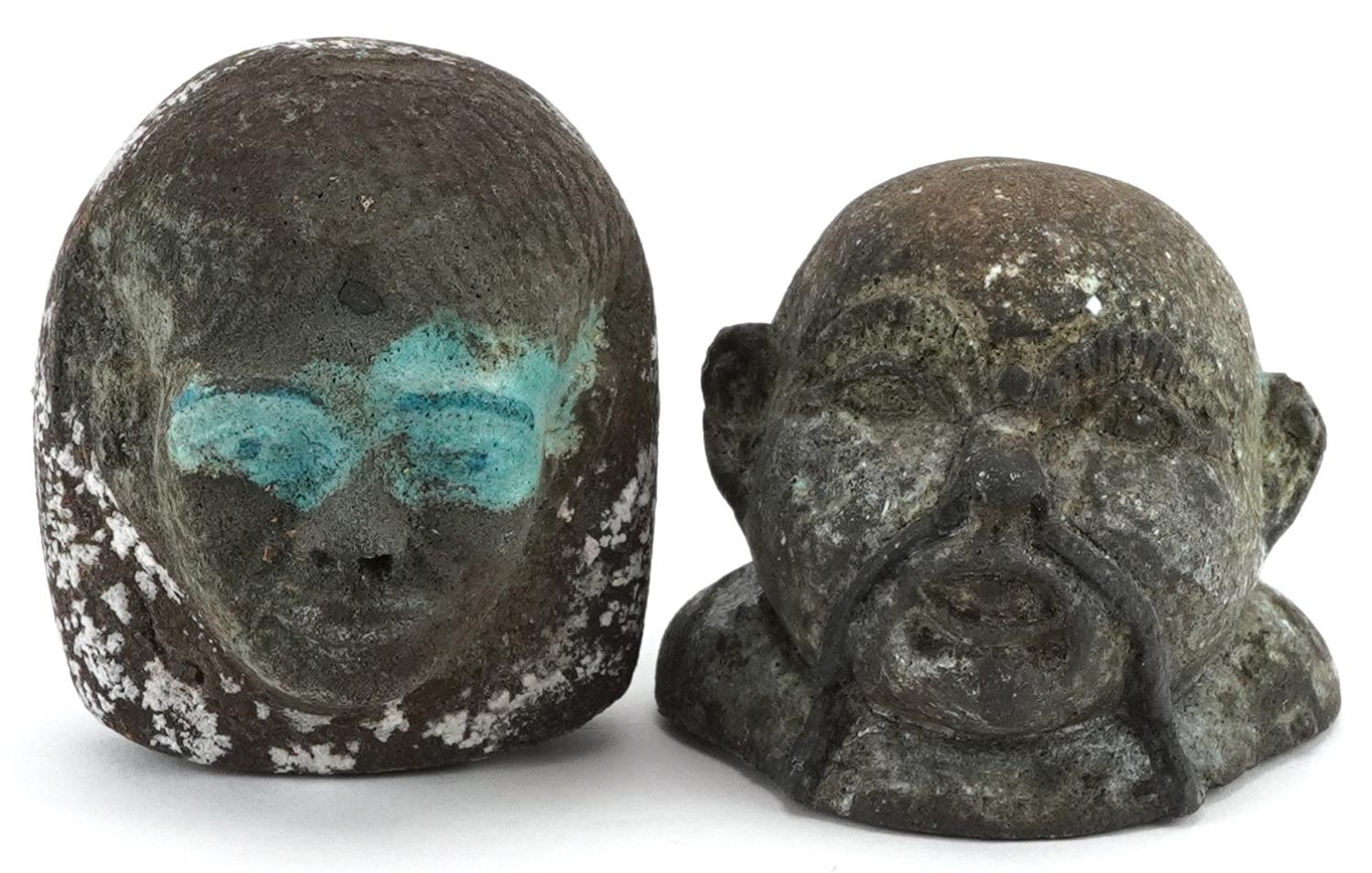 Two Egyptian faience glazed heads including a shabti, the largest 6.5cm high