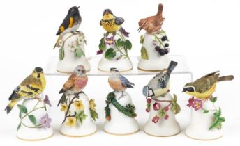 Peter Barrett for Franklin Porcelain, eight hand painted porcelain bird table bells including The