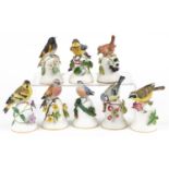 Peter Barrett for Franklin Porcelain, eight hand painted porcelain bird table bells including The