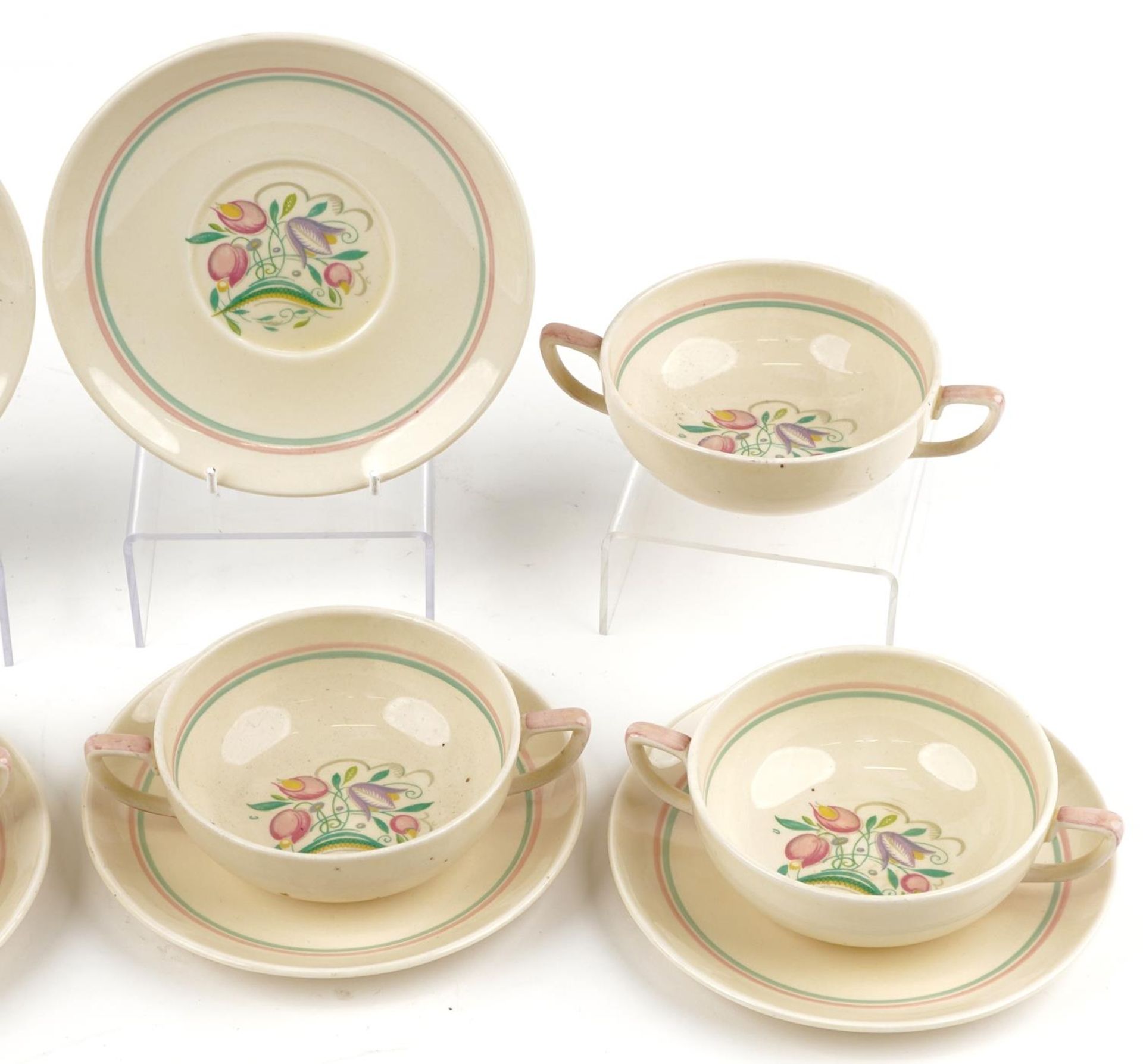 Set of six Susie Cooper twin handled soup bowls and saucers decorated with stylised flowers, each - Bild 3 aus 4