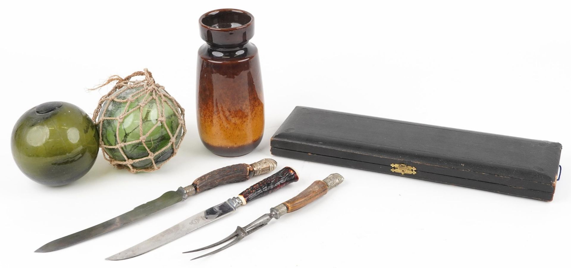 Sundry items including carving knives and two antique green glass floats, the largest 45cm in length