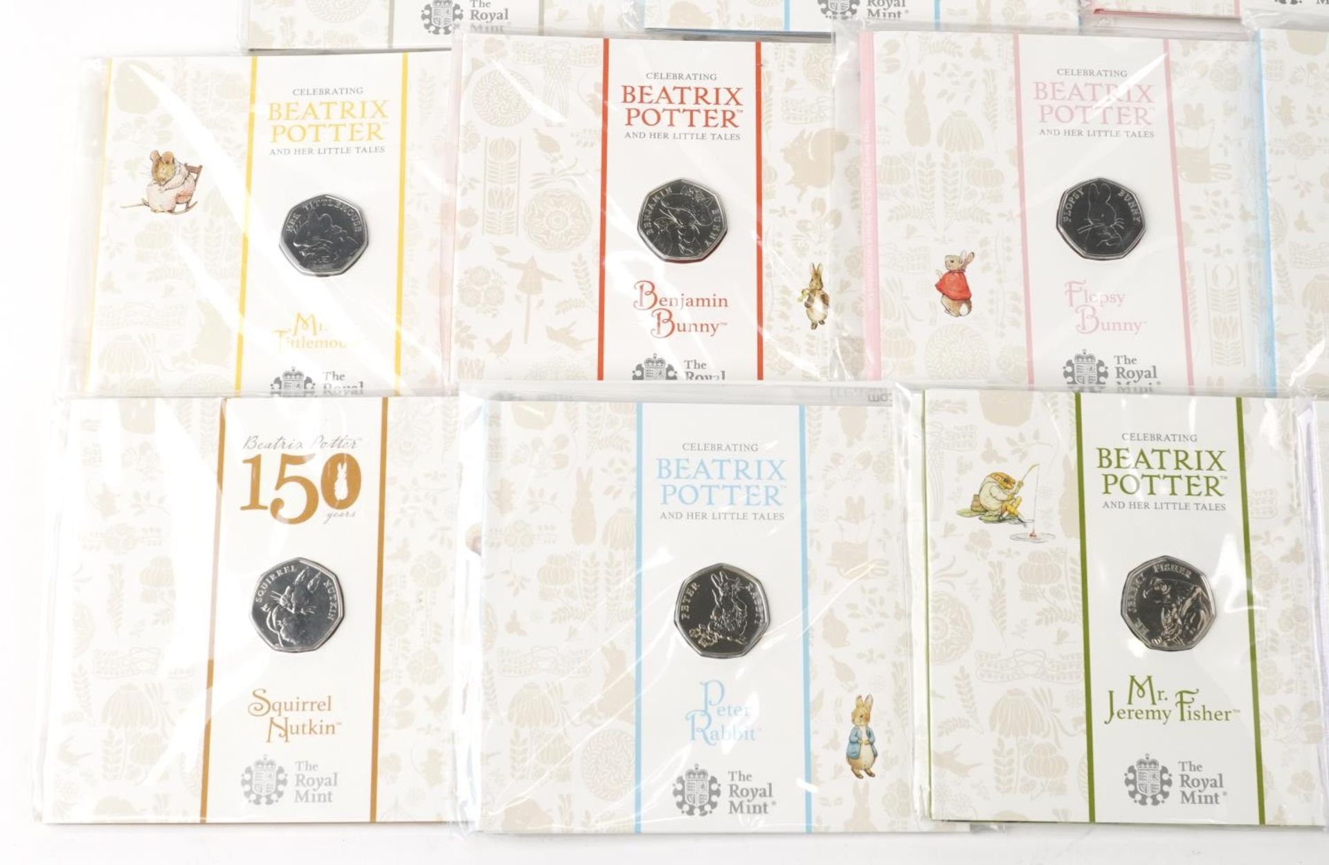 Seventeen Royal Mint Beatrix Potter commemorative fifty pence pieces with wrapping including Peter - Image 2 of 4