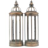 Large pair of bronzed hanging lanterns with glass panels, 85cm high