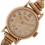 Rotary, ladies 9ct gold manual wind wristwatch having Arabic numerals on a gold plated strap, 22mm