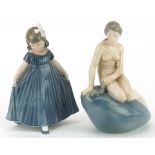 Royal Copenhagen, two Danish porcelain figurines comprising The Little Mermaid by Edvard Eriksen and