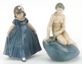 Royal Copenhagen, two Danish porcelain figurines comprising The Little Mermaid by Edvard Eriksen and