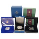 Three silver proof coins by The Royal Mint with fitted cases, comprising Millennium silver proof