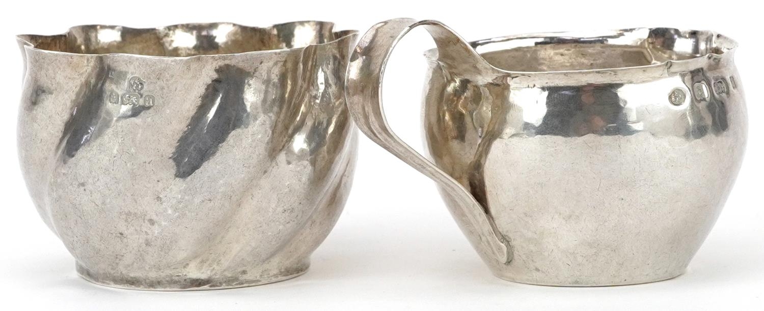 Robert Temple for Keswick School of Industrial Arts, Arts & Crafts silver planished jug and sugar - Image 2 of 6