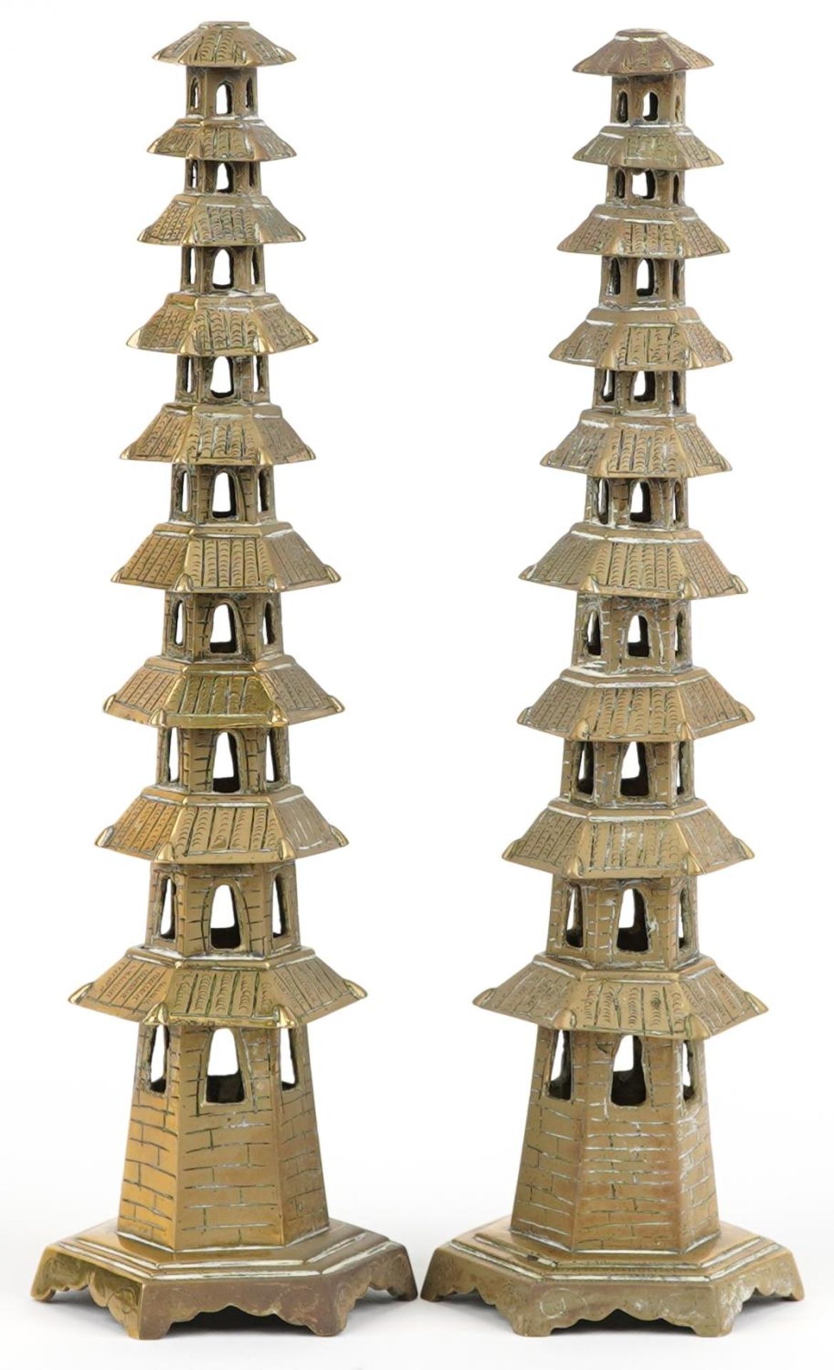 Pair of Chinese brass or bronze incense burners in the form of pagodas, 34cm high