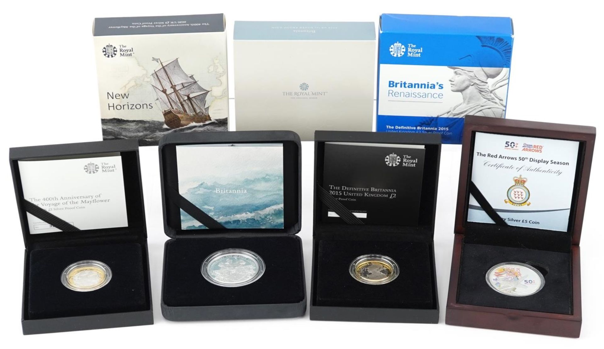 Four silver proof coins with cases, three by The Royal Mint with boxes, comprising 2015 Definitive