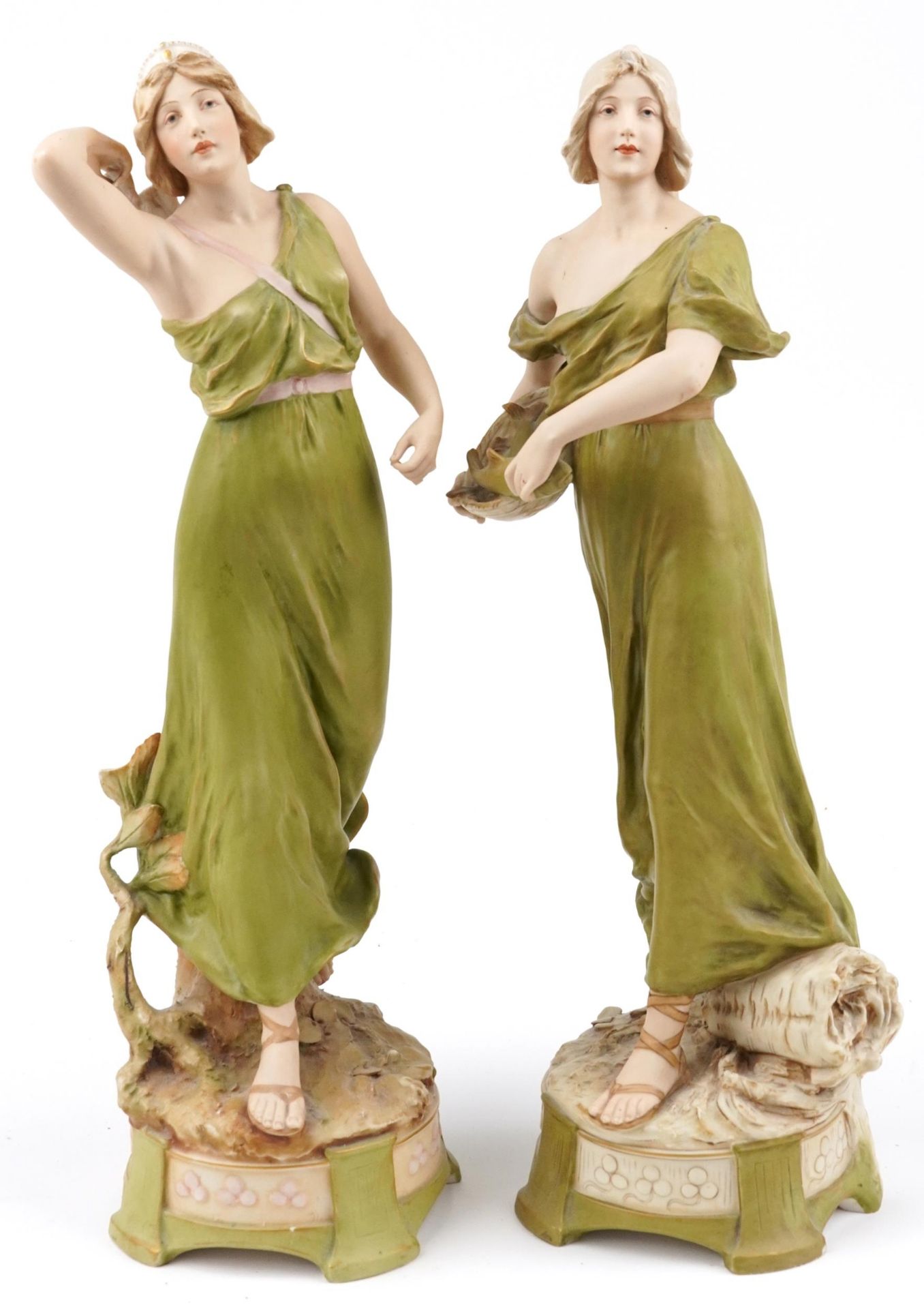 Royal Dux, large pair of Czechoslovakian Art Nouveau figurines of scantily dressed females including