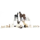 Collectable china including Beswick horses, Beswick Siamese cat and a Wade Disney blow up Siamese