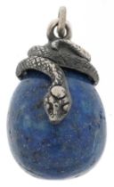 Lapis lazuli pendant mounted with a silver serpent, impressed Russian marks to the back, 2.8cm high,