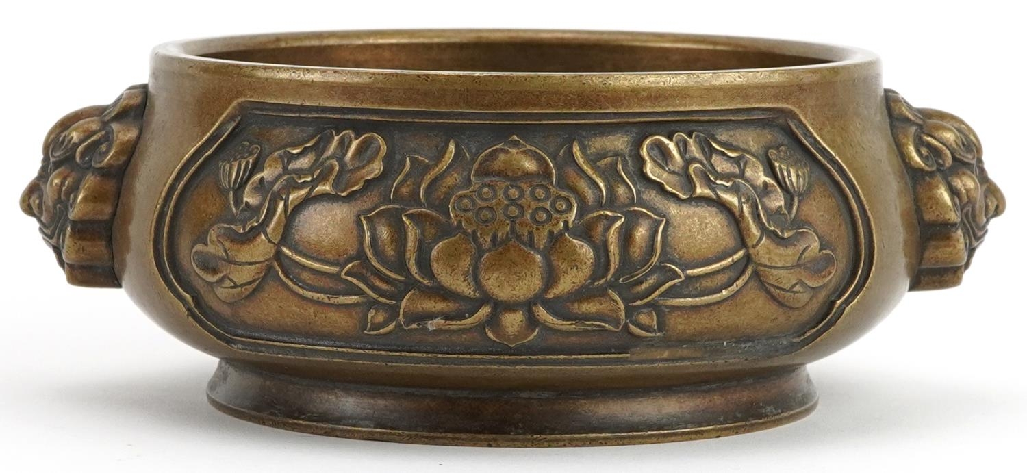 Chinese patinated bronze censer with animalia handles cast in relief with panels of flowers, four - Image 3 of 7