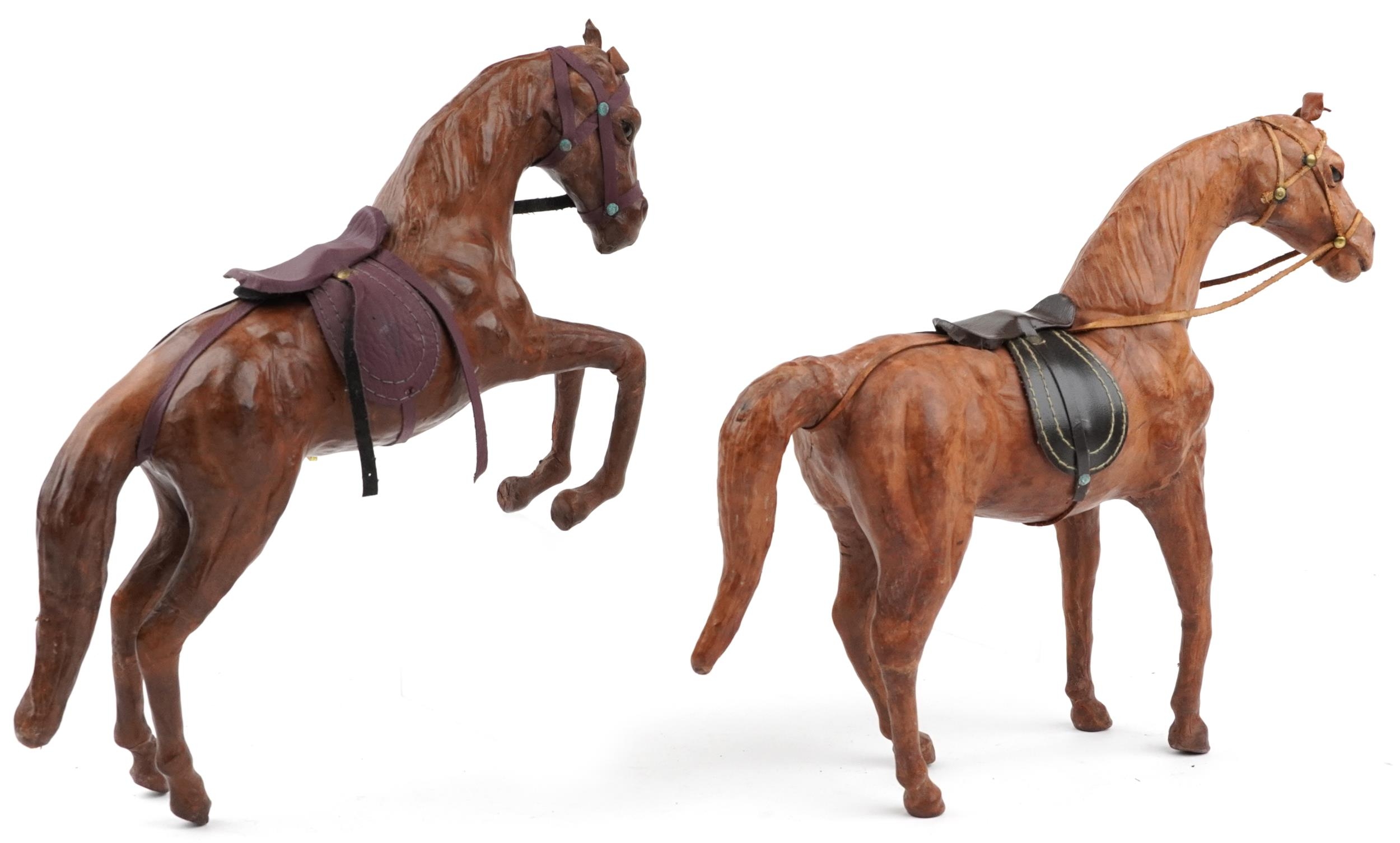 Manner of Liberty & Co, two leather covered horses including a rearing example, 40cm high - Image 2 of 3