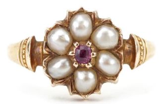Victorian 15ct gold ruby and pearl flower head ring, size M, 2.1g