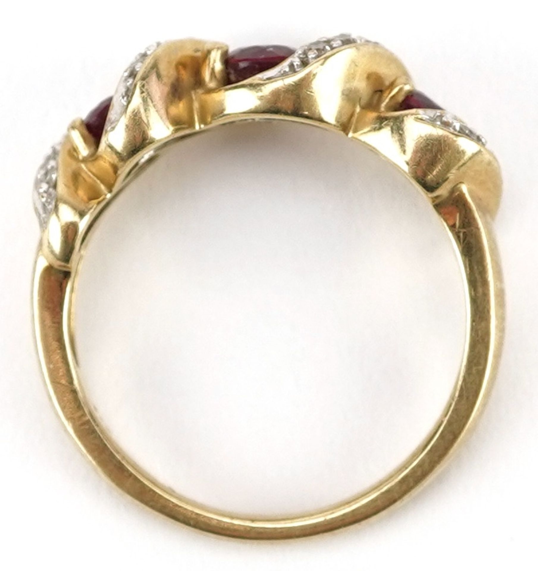 9ct gold diamond and ruby crossover ring, total diamond weight approximately 0.10 carat, the largest - Image 3 of 5