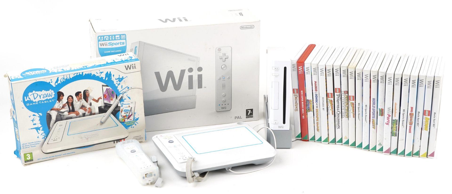 Nintendo Wii games console with accessories and a collection of games including U Drew, Wii Sports